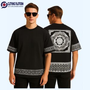Black drop shoulder t-shirt with white geometric printed design on sleeves, hem, and back panel.